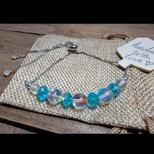 Handmade Rainbow Supernova Galaxy Bracelet with blue crystals Platinum plated